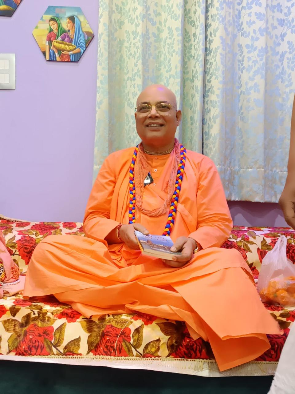 Spiritual teaching session with devotees, showcasing the warmth of community learning and shared wisdom